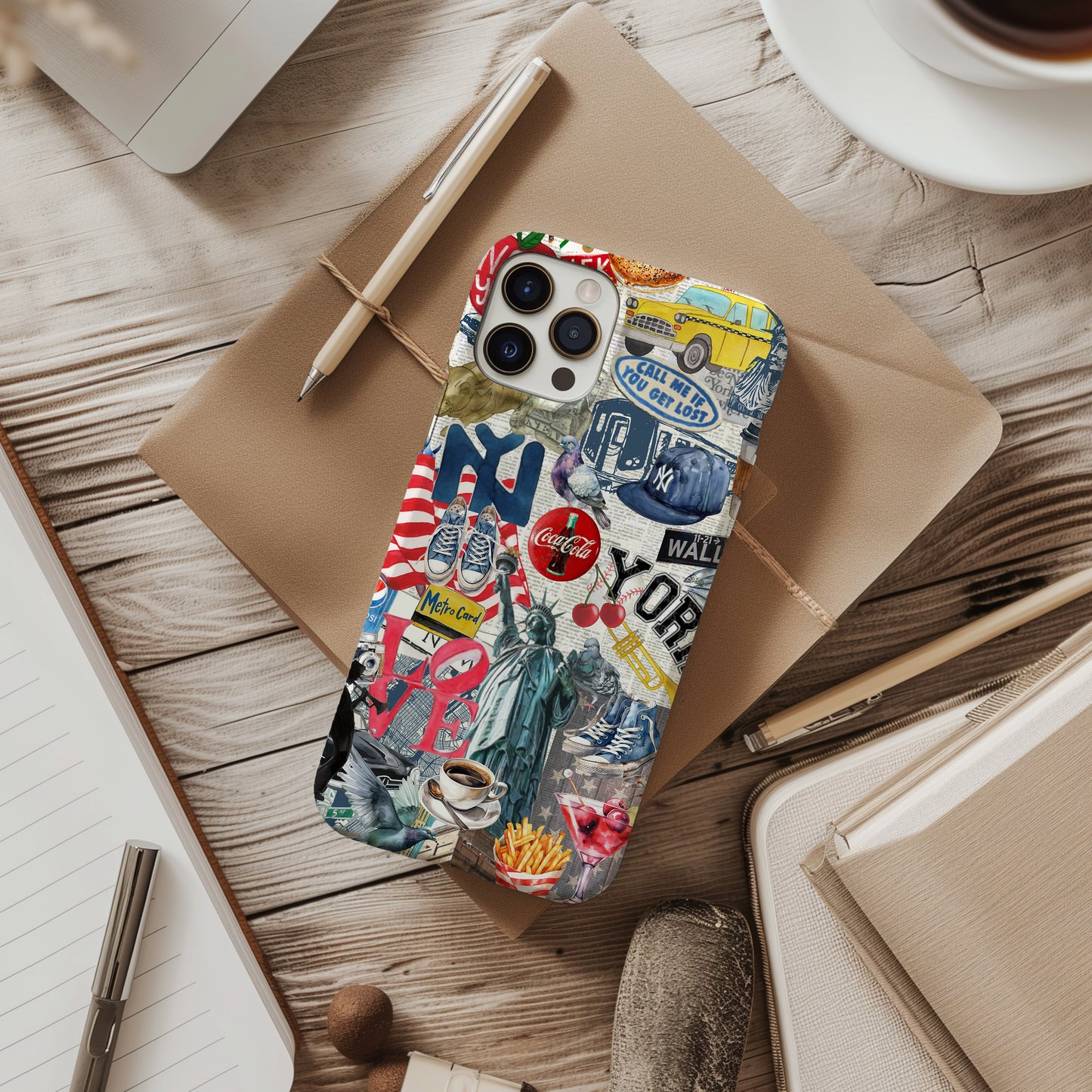 desk view of NY City Collage Phone Case. Scrapbook style collage phone case. New York City phone case for iPhone and Samsung Galaxy by Artscape Market