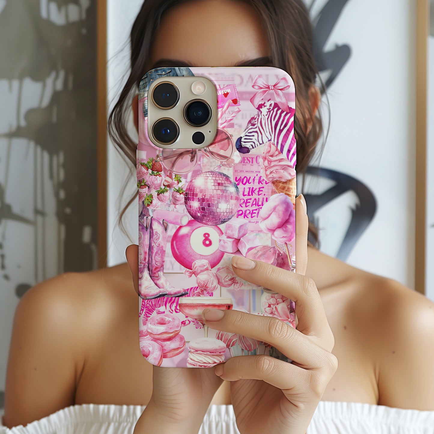 Girl Holding Pink Collage Phone Case Watercolor scrapbook style with pink images including pink zebra, disco ball 8 ball, cowgirl boots, candy, sweets and bubble gum. Phone cover by Artscape Market
